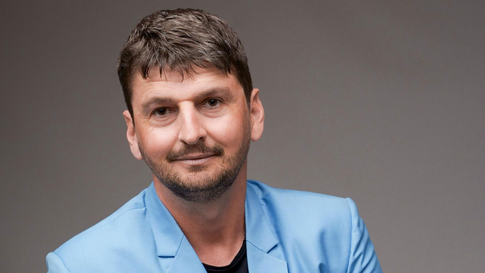 Tudor-Marchis—Bog’Art-Building-Management